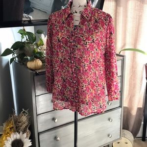 Pretty sheer pleated blouse.